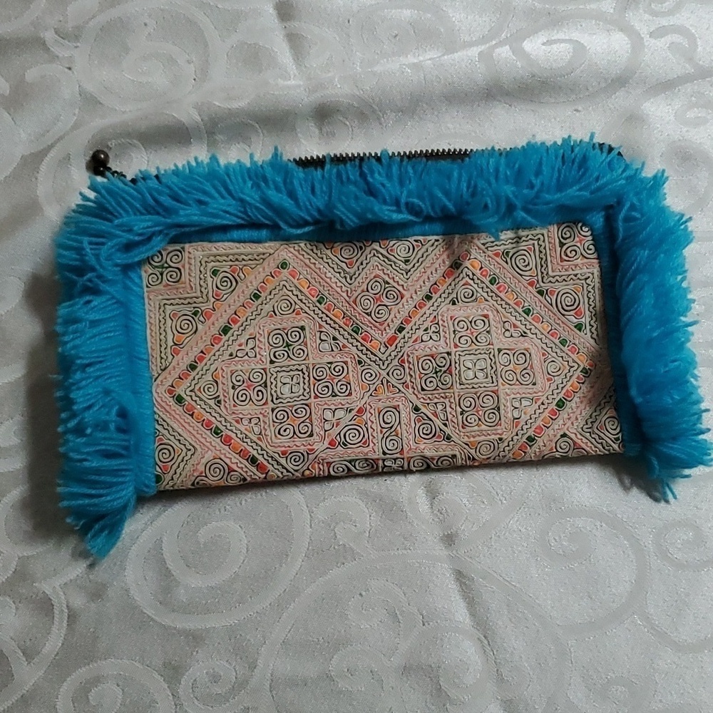 JADEtribe Panada fringe blue clutch